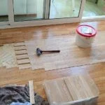 Reparación de parquet encolado de tablilla de roble en Barcelona